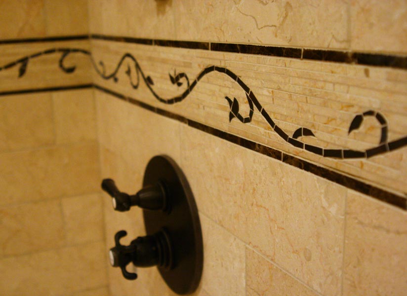 Glass tile mosaic and marble mosaic shower